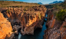 A wide shot of Bourkeâ€™s Luck Potholes in Mpumalanga, South Africa; a geological formation carved out by the movement of water